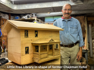 Little Free Library in shape of former Chapman Hotel